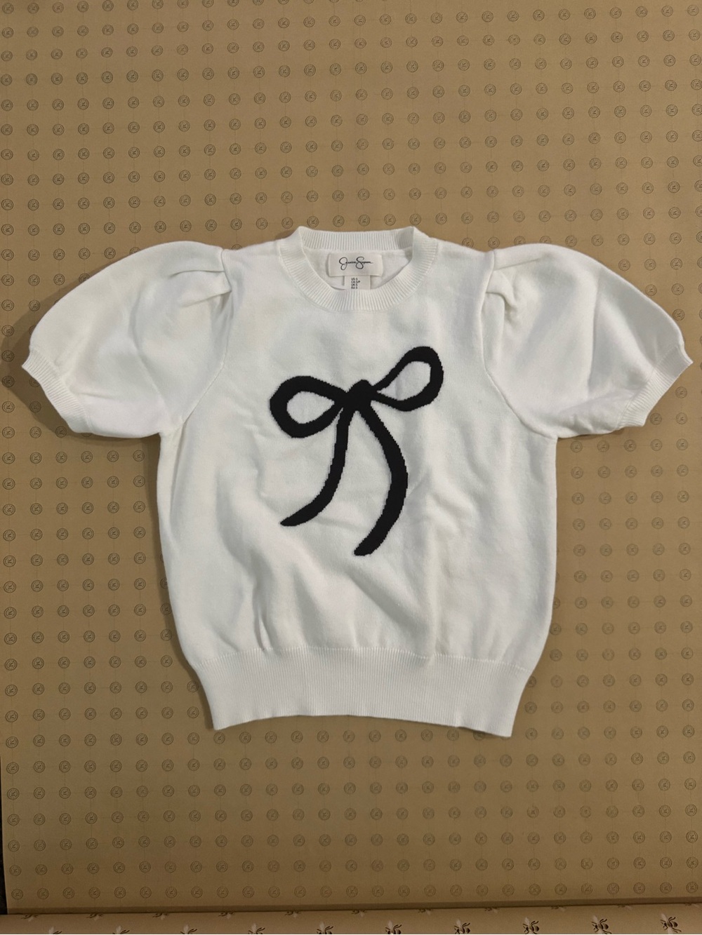 Jessica Simpson White Puff-Sleeve Sweater with Black Bow Applique